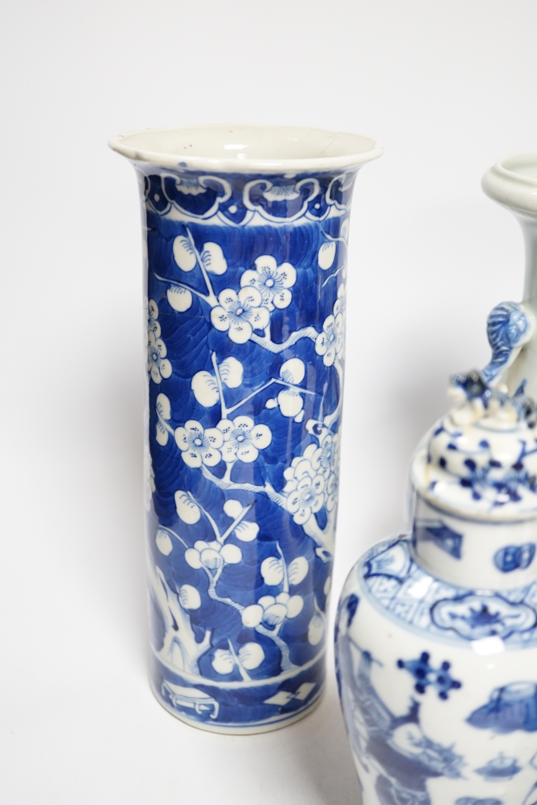 A late 19th century Chinese blue and white twin elephant head handle vase and five other 19th century Chinese blue and white vases, tallest 26cm